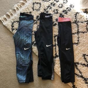 bundle of 3 pairs of nike pro capri leggings